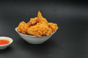 Platter of golden-fried chicken pieces