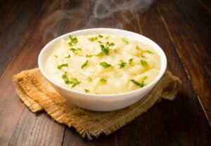 A close-up view of a bowl filled with creamy Kheer,